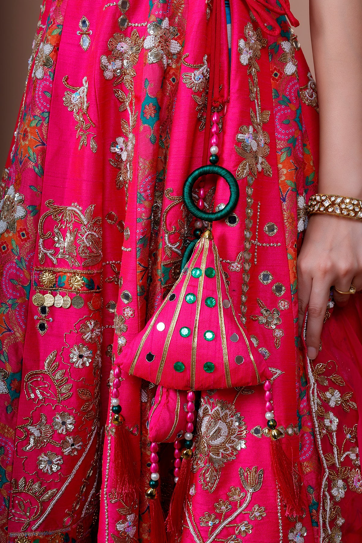 Magenta Lehenga Choli in Silk embellished with heavy embroidery