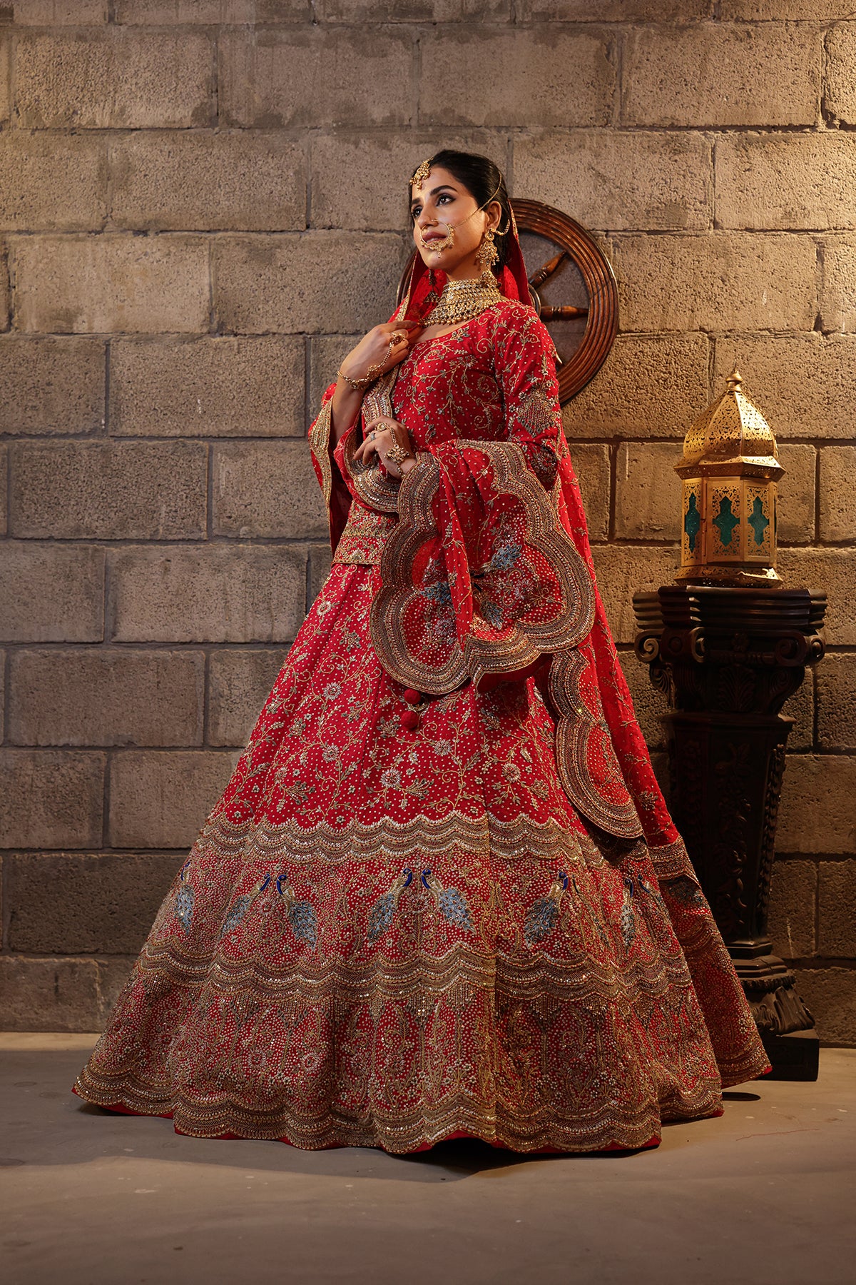 Red Lehenga with peplum adorned with Heavy embroidery