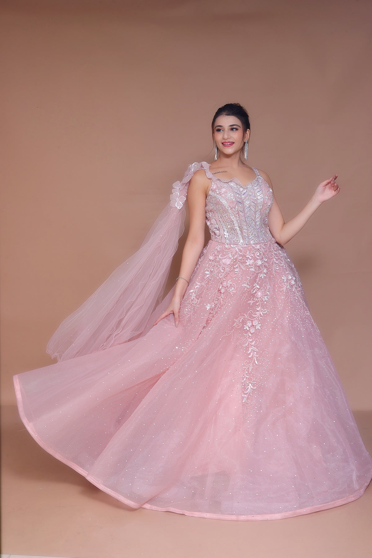 Pink Gown in Net embellished with hand embroidery on yolk