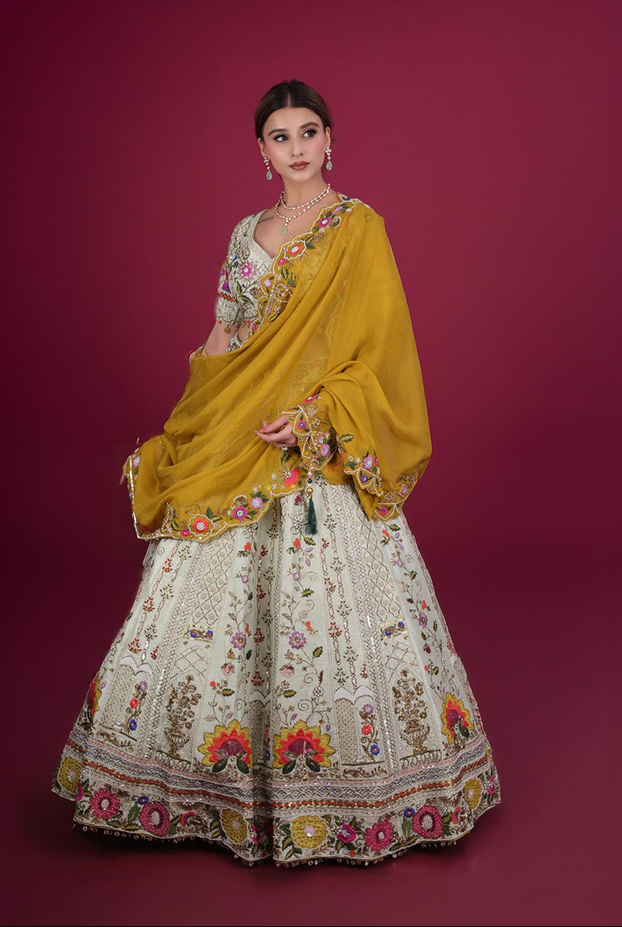 Pista Green lehenga with mustard Dupatta in Silk