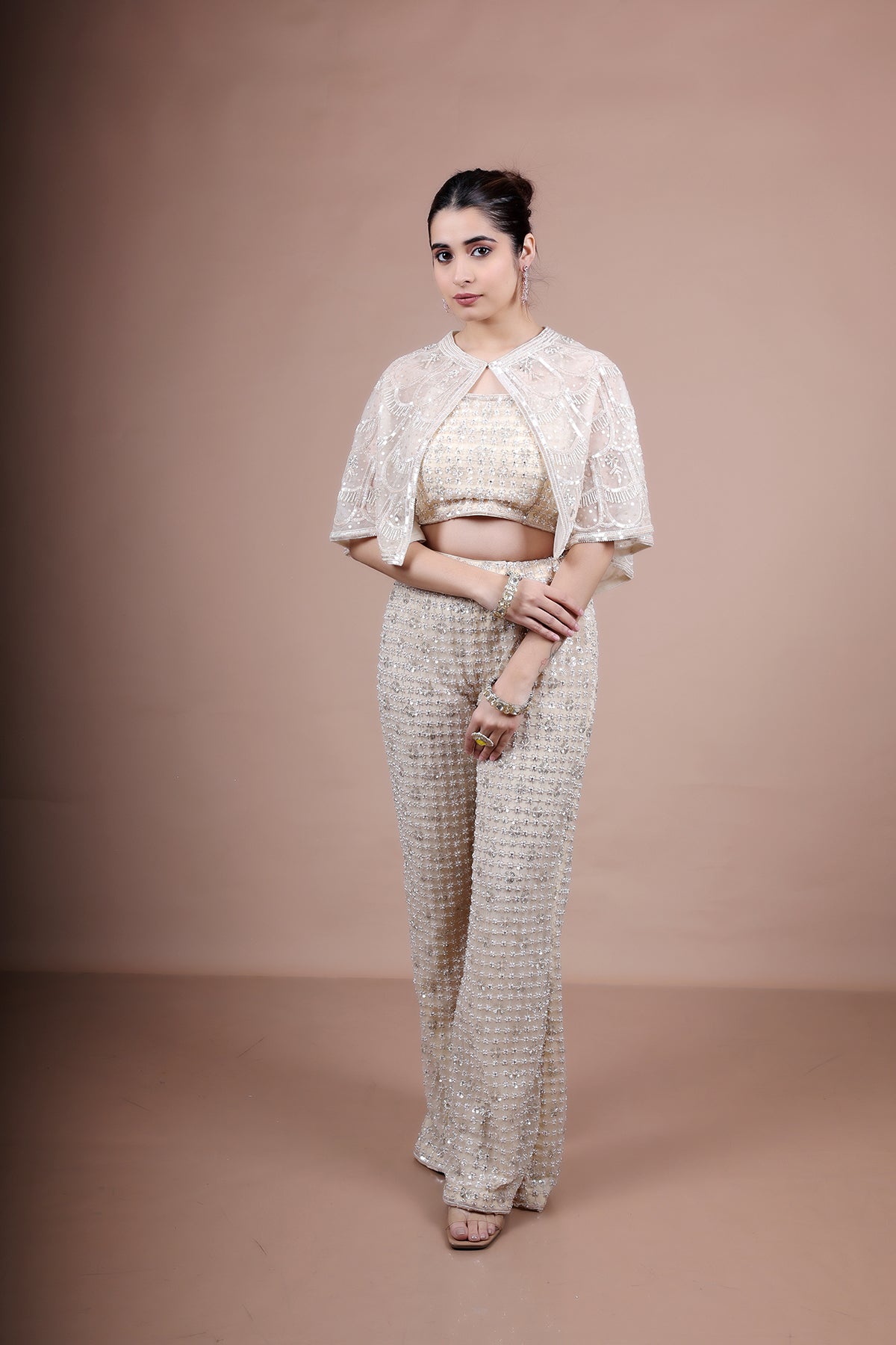 Beige hand embroidered coord set with ponchu
