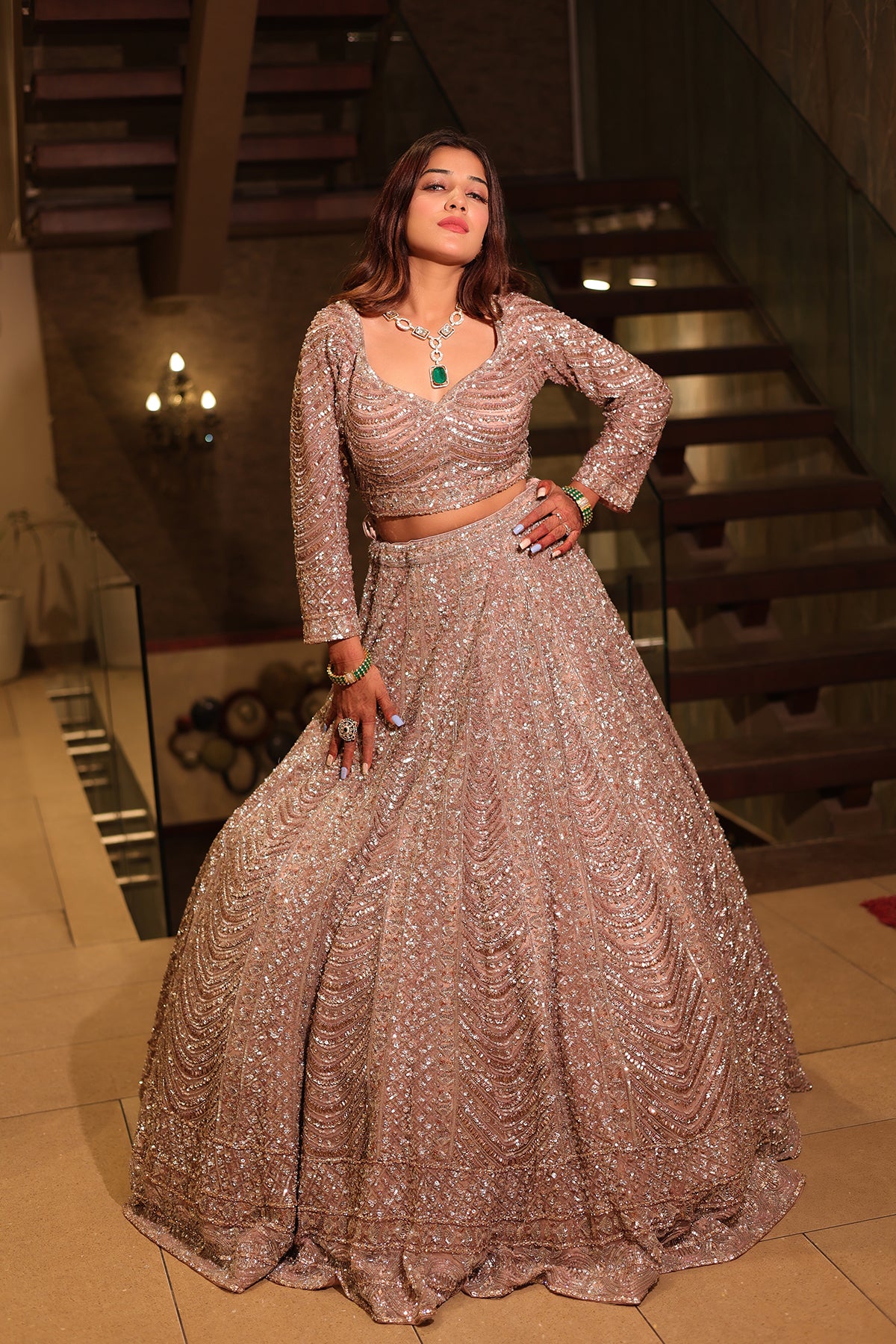 Rose Gold Lehenga Choli adorned with hand embroidery