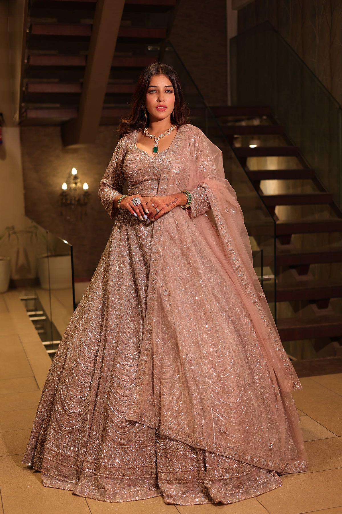 Rose Gold Lehenga Choli adorned with hand embroidery