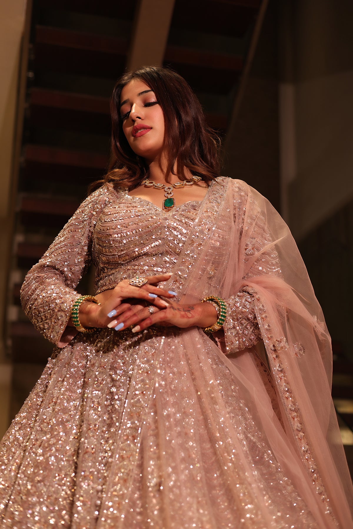 Rose Gold Lehenga Choli adorned with hand embroidery