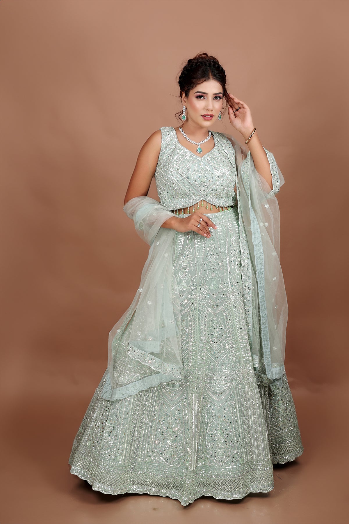 Sea Green Lehenga in Net fabric adorned with thread, pearl and cut dana embroidery