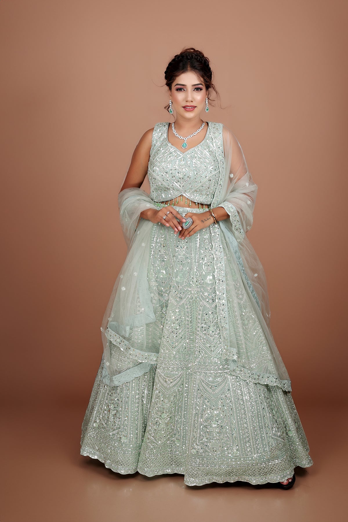 Sea Green Lehenga in Net fabric adorned with thread, pearl and cut dana embroidery