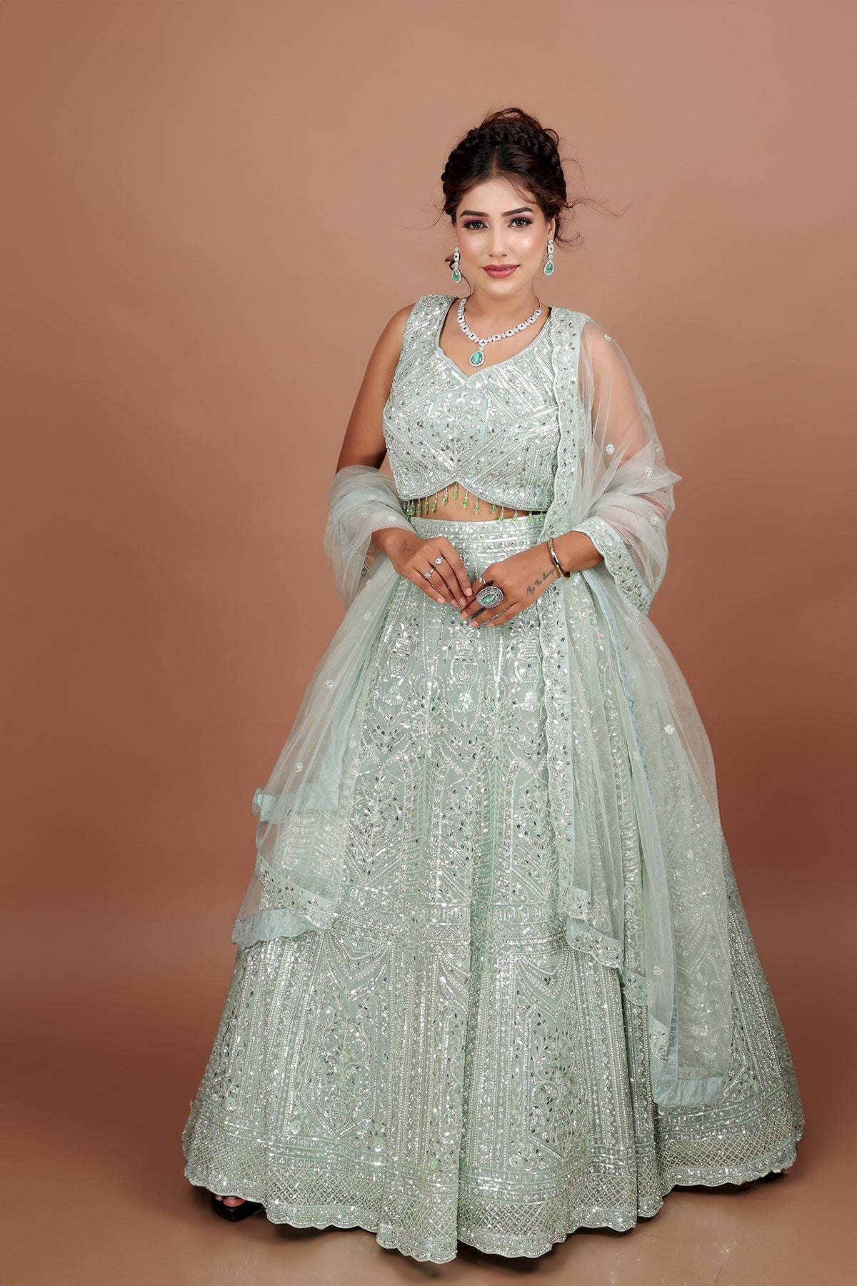 Sea Green Lehenga in Net fabric adorned with thread, pearl and cut dana embroidery