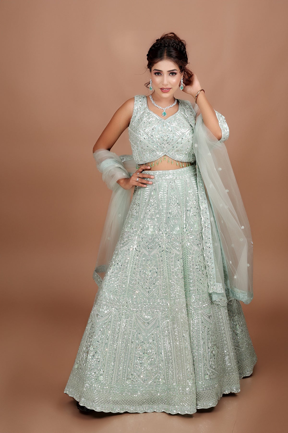 Sea Green Lehenga in Net fabric adorned with thread, pearl and cut dana embroidery