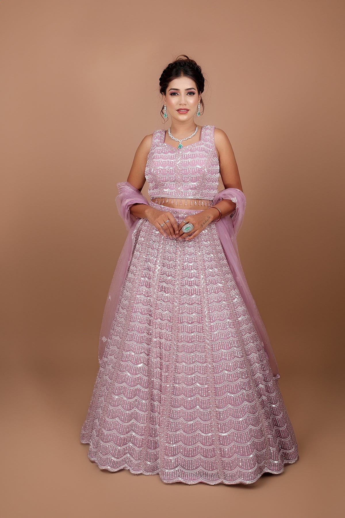 Mauve Lehenga in Net fabric adorned with thread, pearl and cut dana embroidery