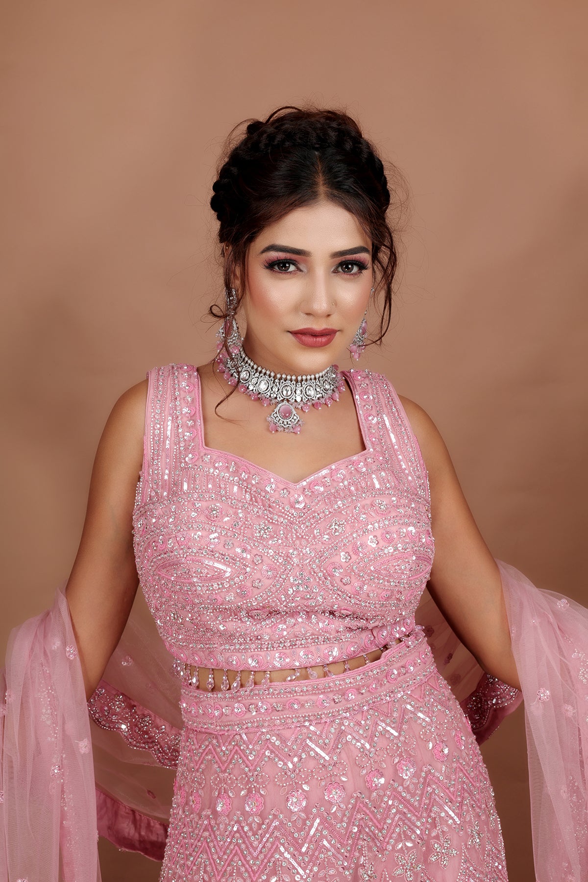 Pink Lehenga in Net fabric adorned with thread, pearl and cut dana embroidery