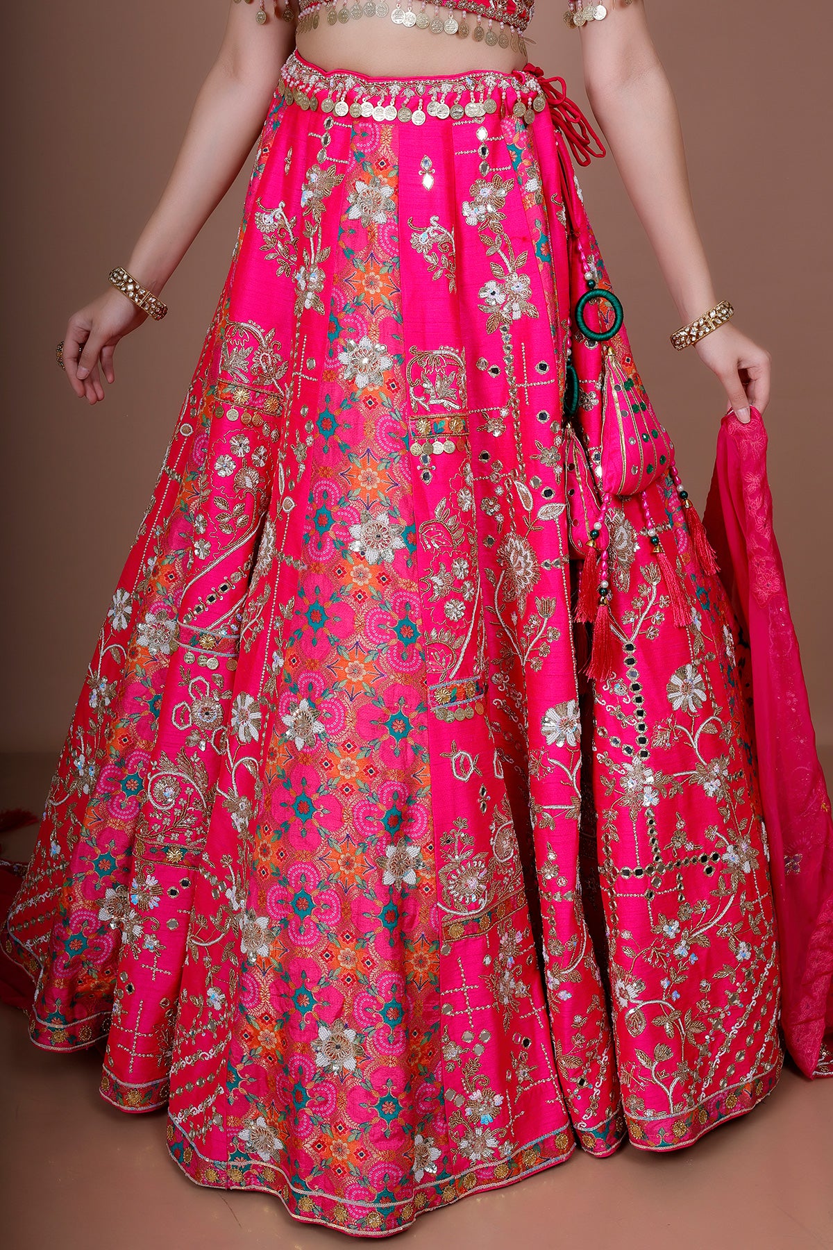 Magenta Lehenga Choli in Silk embellished with heavy embroidery