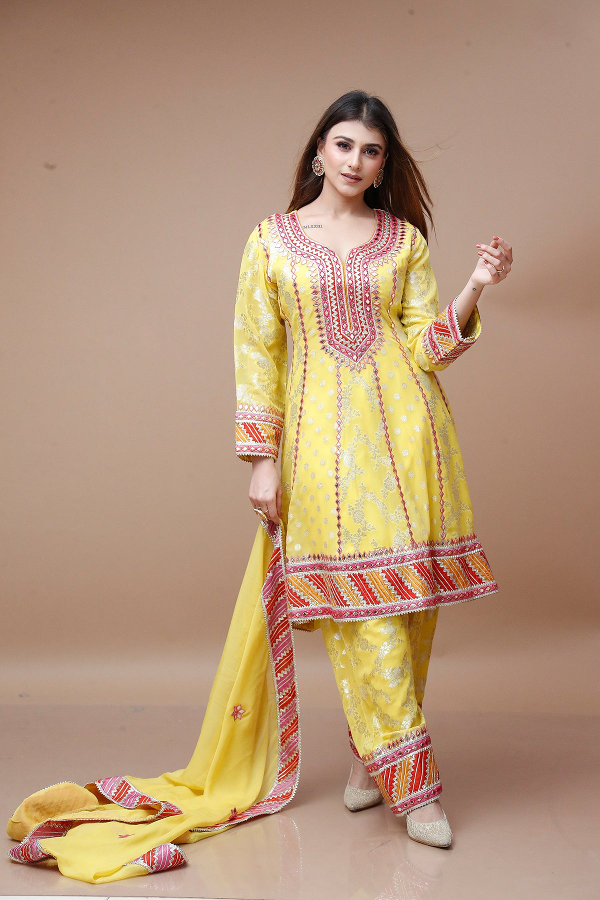 Yellow Banarasi Weaving Salwar Suit adorned with Gotta Patti