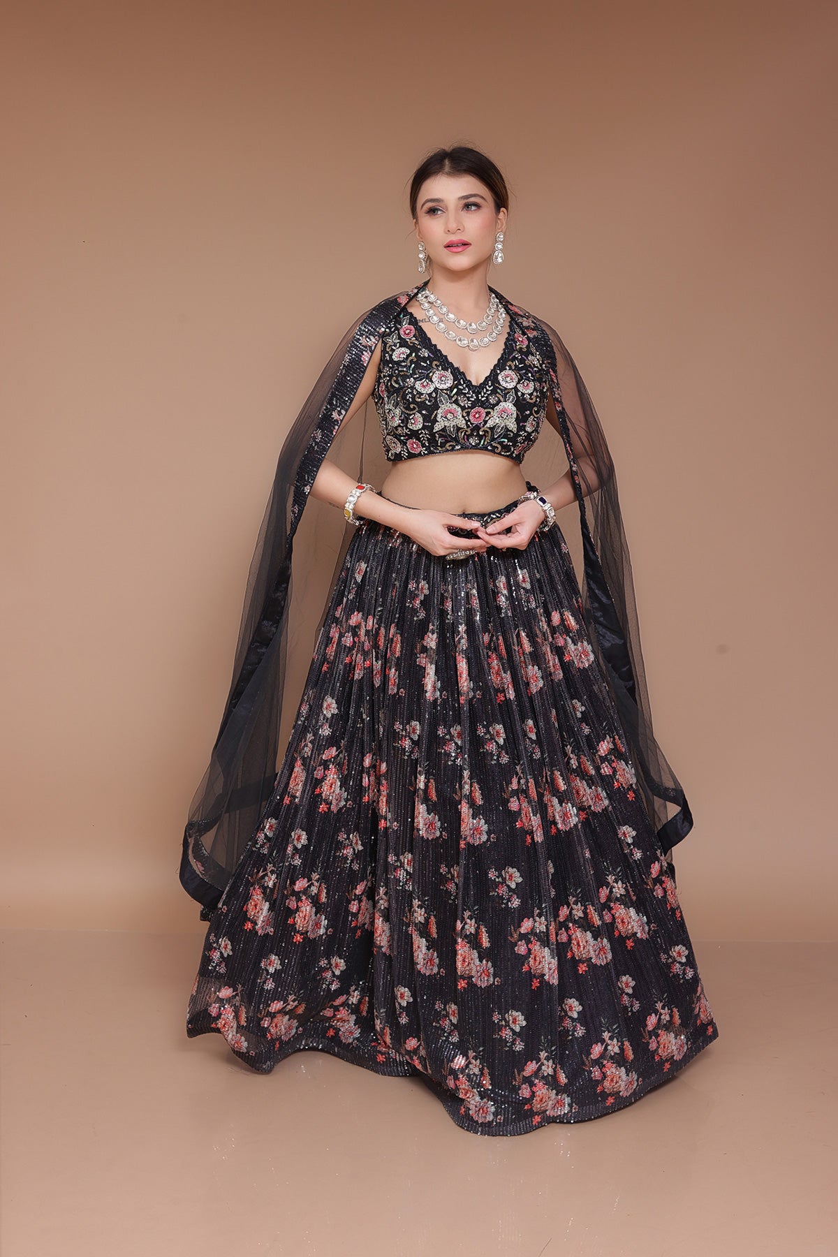 Black Lehenga choli in sequin fabric embellished with nalki work