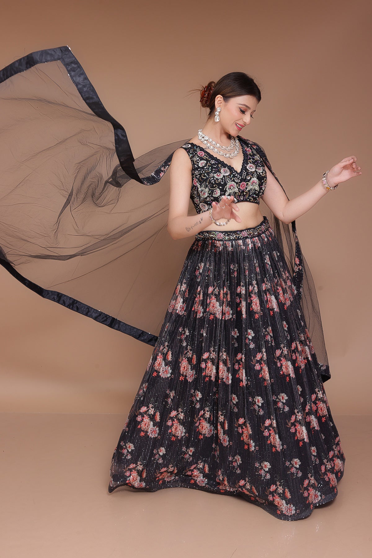 Black Lehenga choli in sequin fabric embellished with nalki work