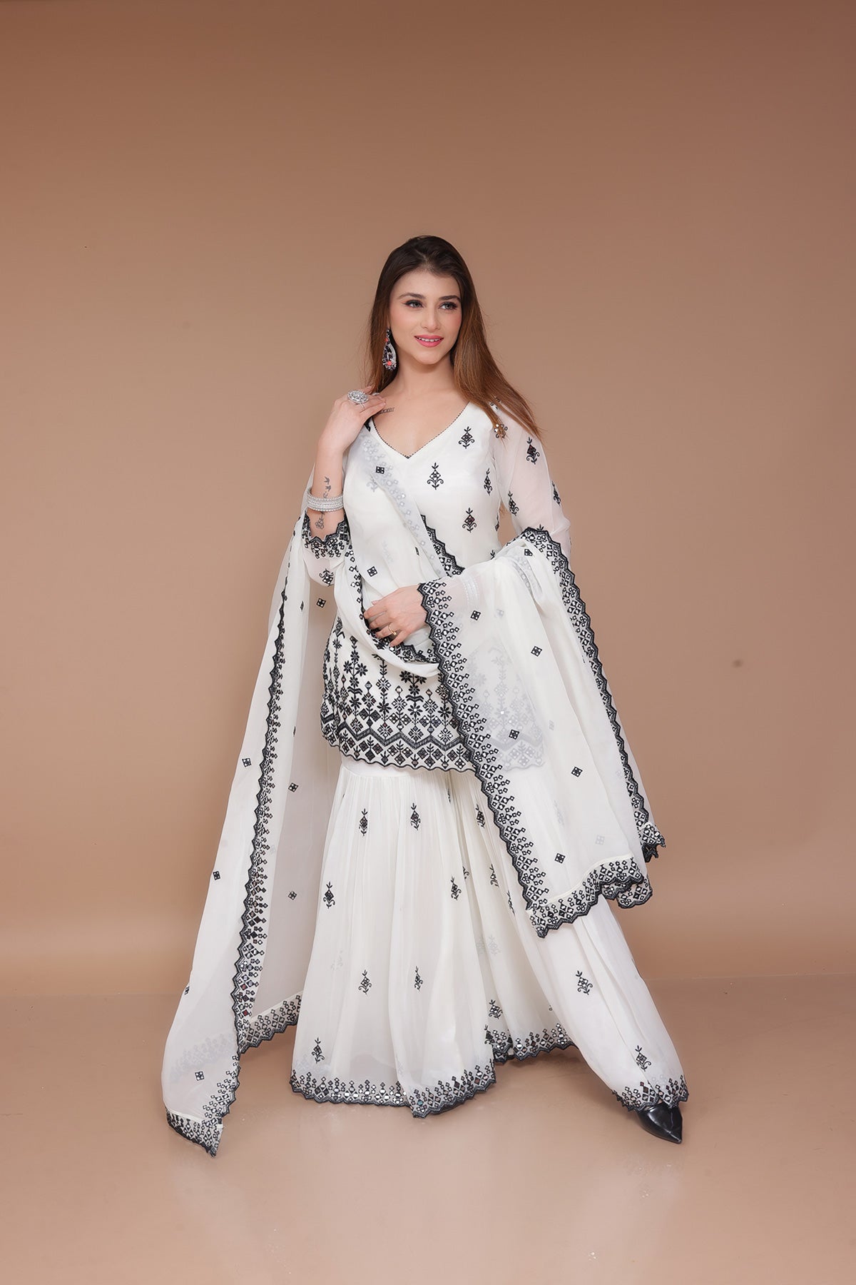Cream Garara Suit in Georgette embellished with Thread and mirror work