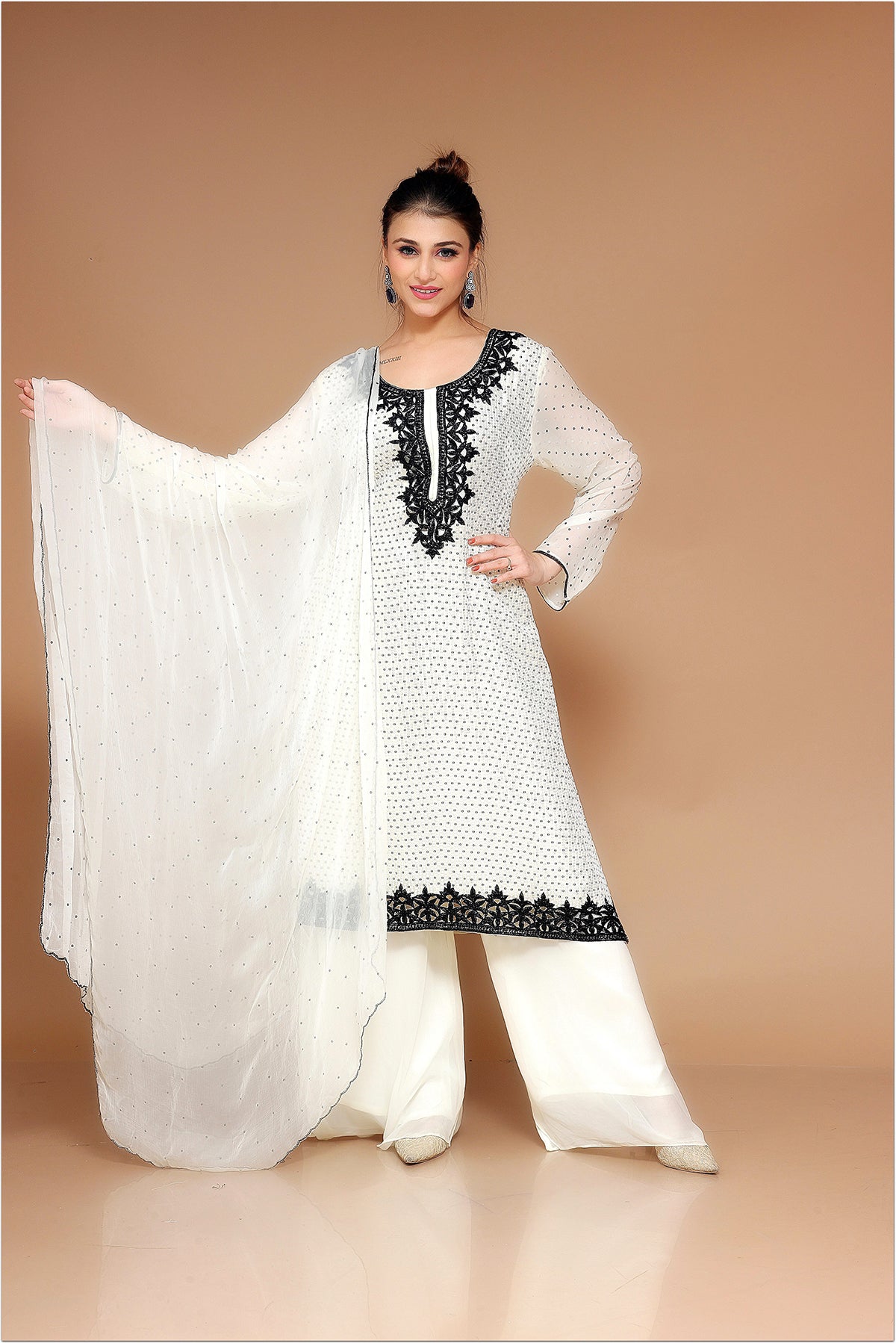 White Palazzo Suit in Georgette adorned with pearl embroidery