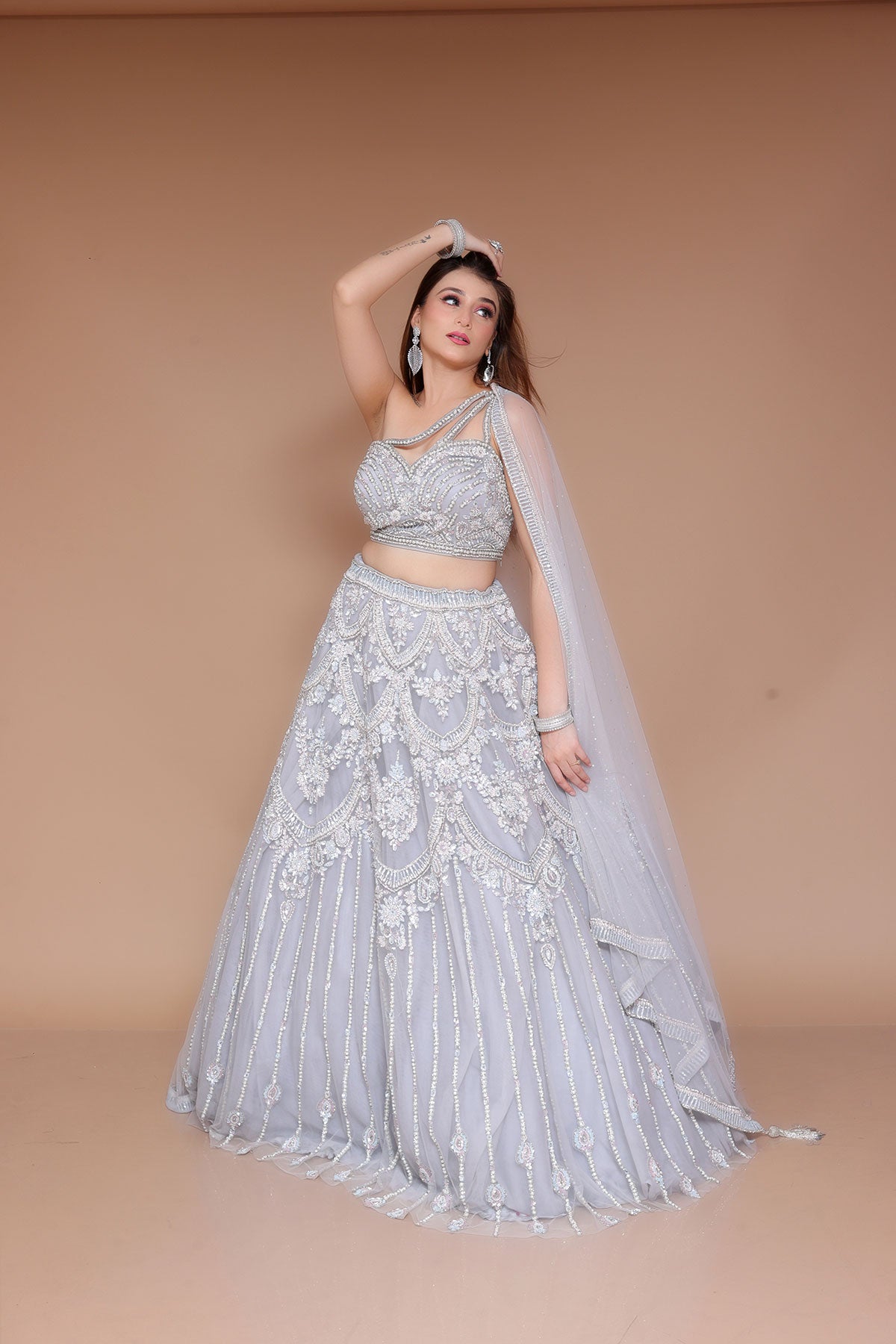 Grey Lehenga with styling top in net