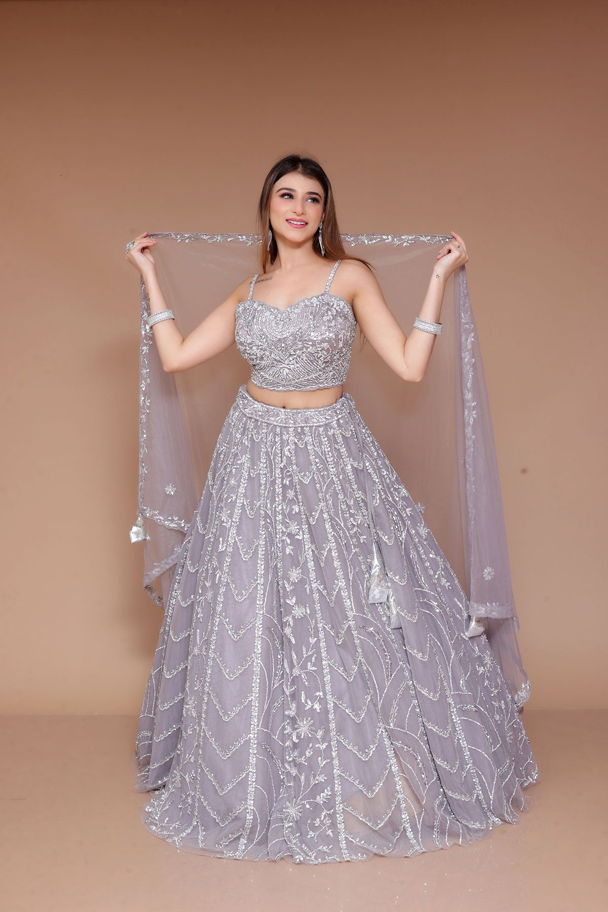 Grey Lehenga with hand embroidered top in net