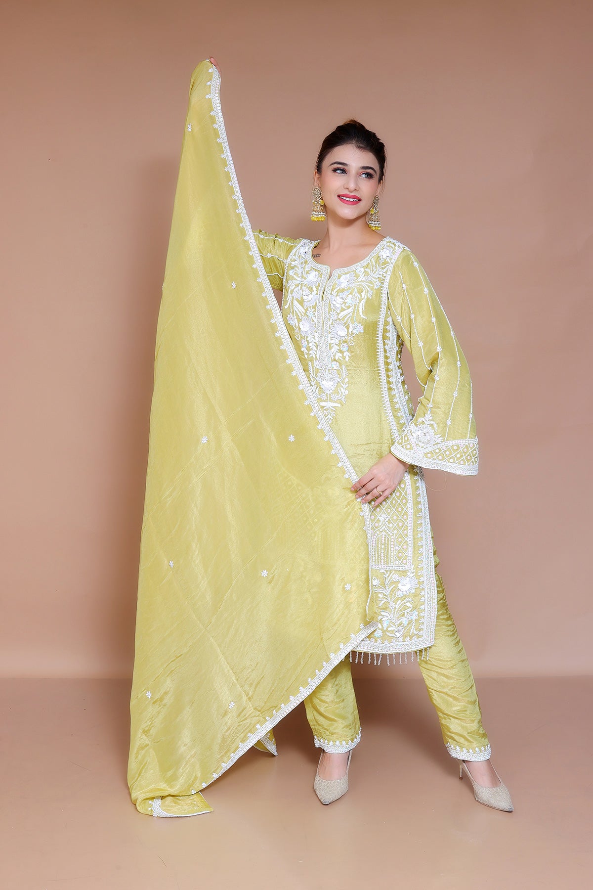 Perrot Green Pent Suit adorned with pearl work