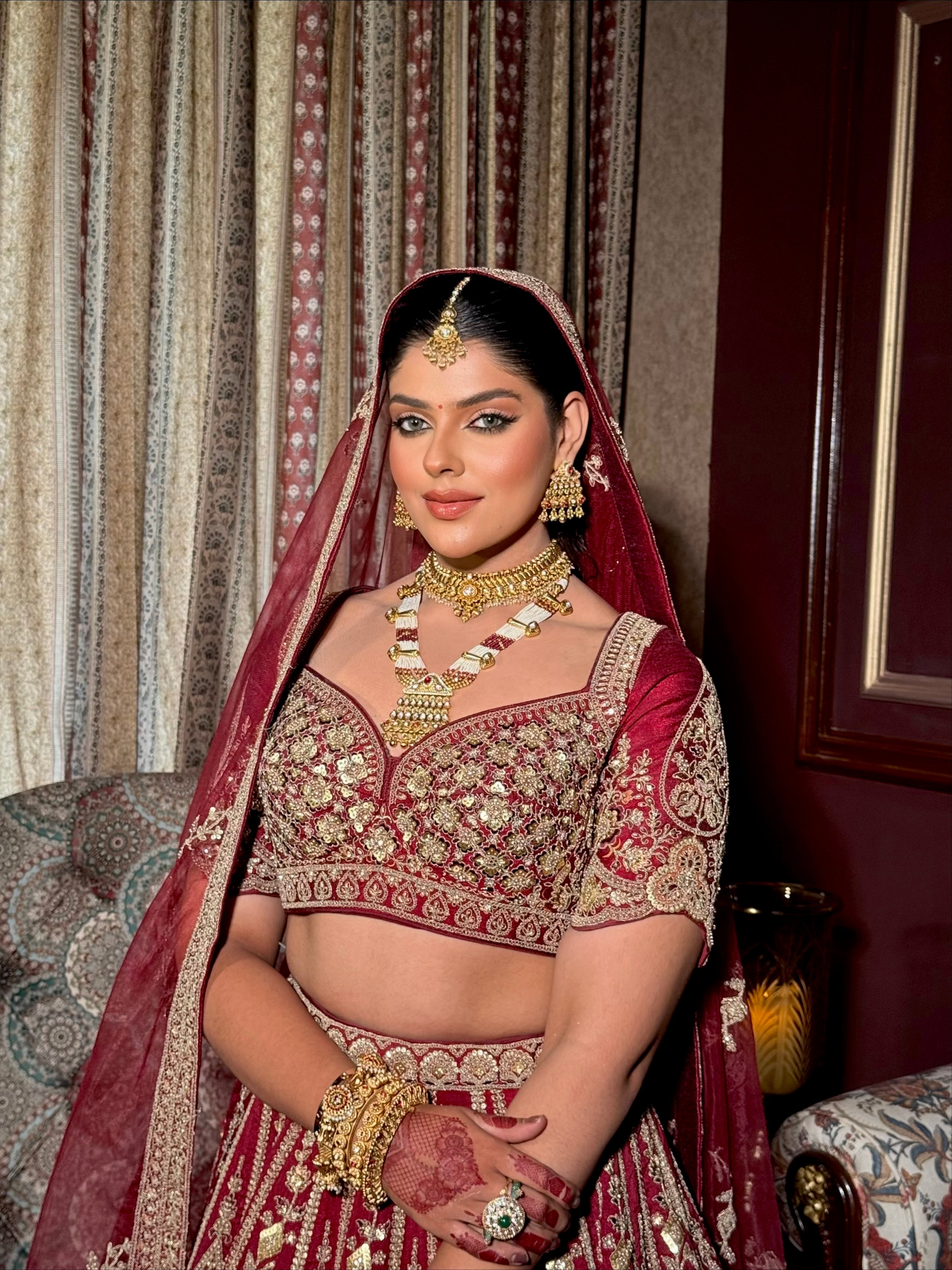 Royal Maroon Bridal Lehenga with Intricate Zardozi Embroidery