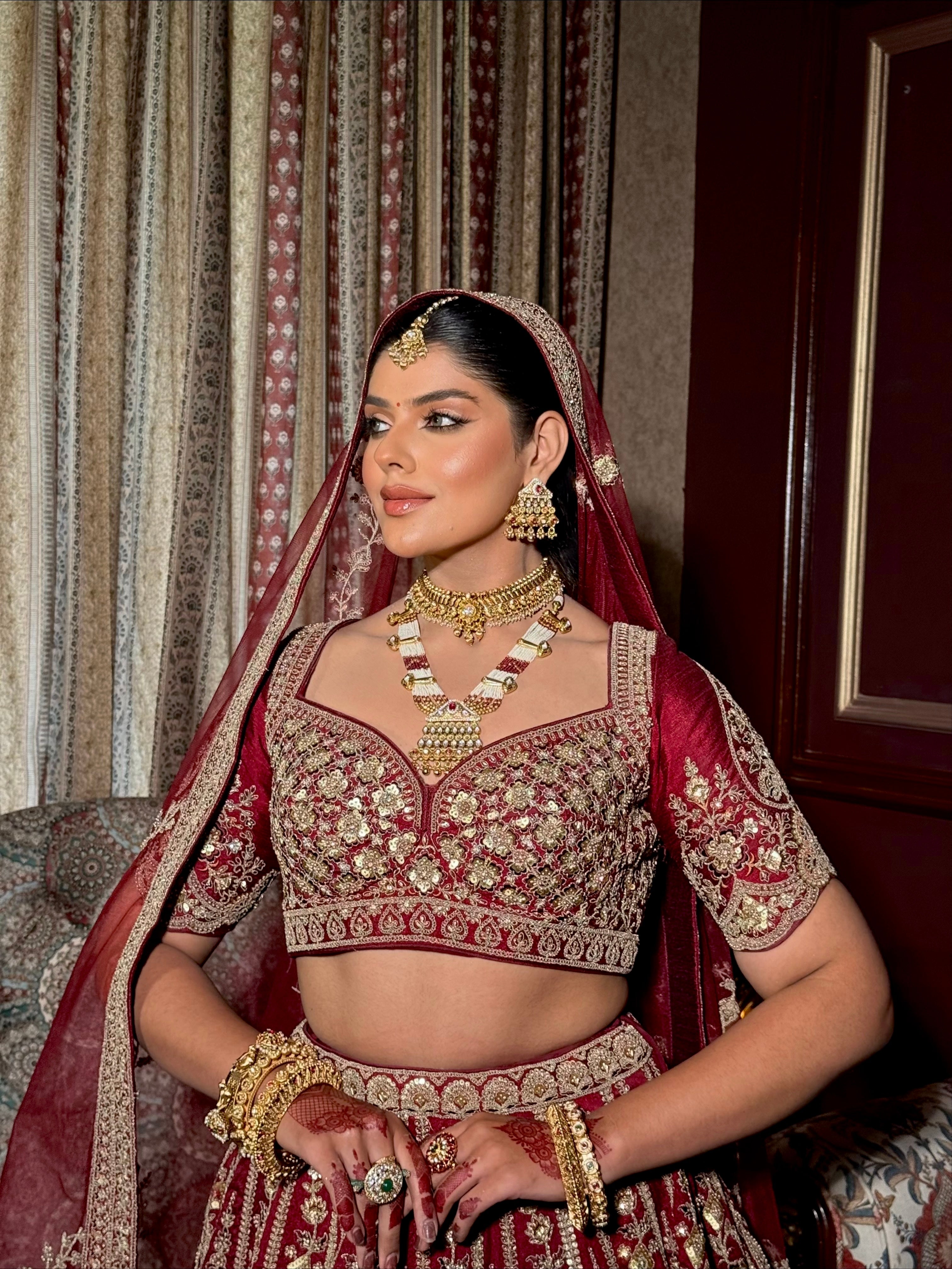 Royal Maroon Bridal Lehenga with Intricate Zardozi Embroidery