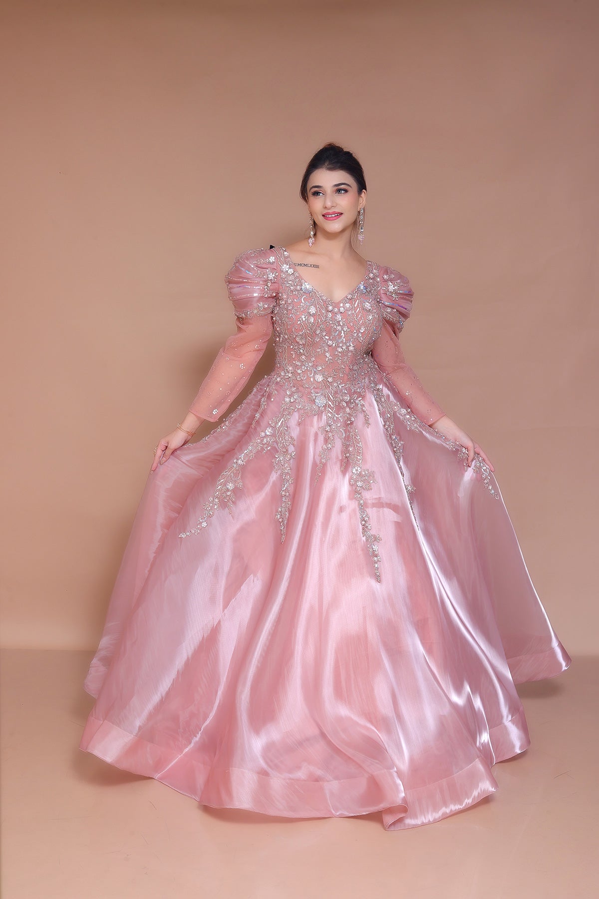 Pink Gown in Net embellished with hand embroidery on yolk